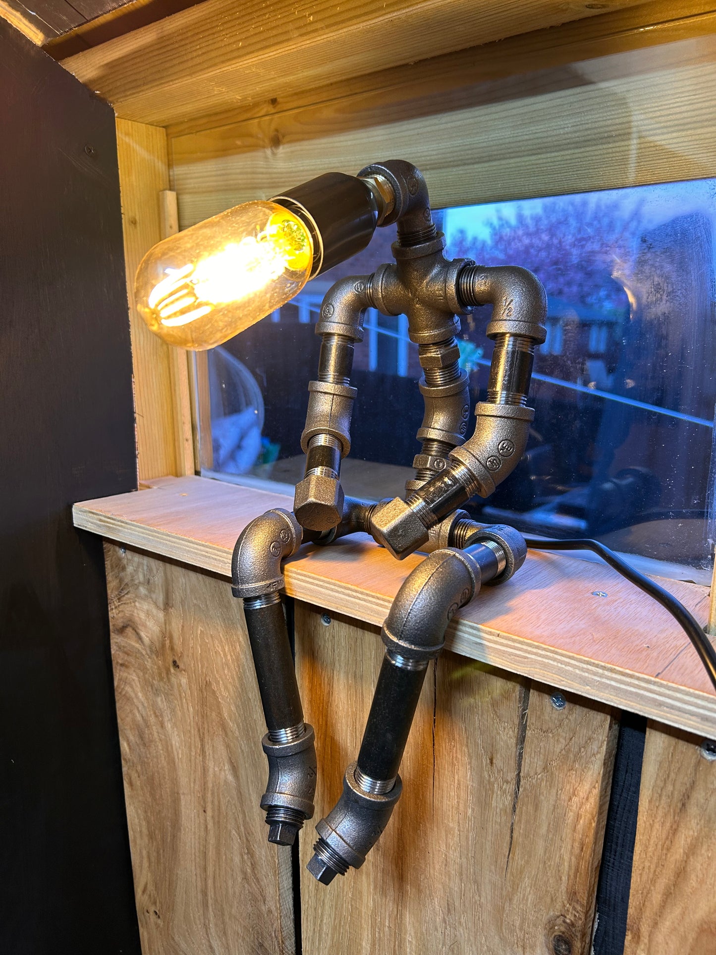 The Thinking Man - Industrial Pipe Man Lamp