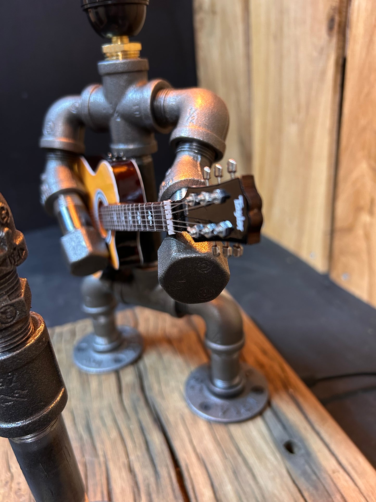"Unplugged" - Industrial Pipe Man Guitar Lamp