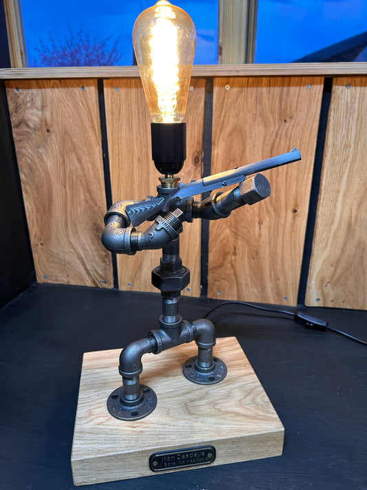 The Iron DeadEye - Clay Pigeon Pipe Man Lamp