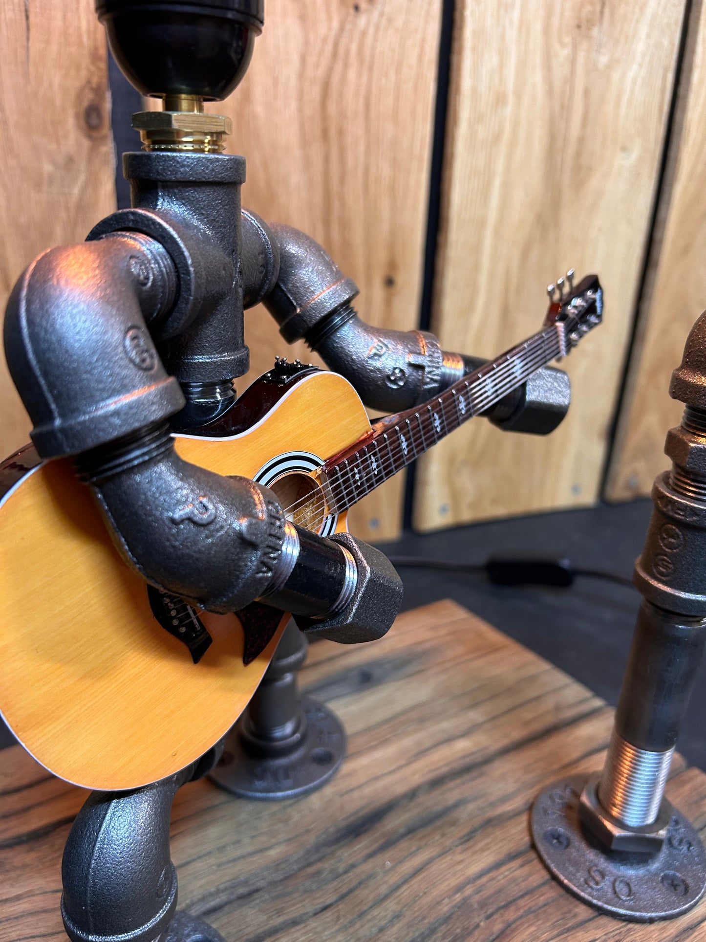 "Unplugged" - Industrial Pipe Man Guitar Lamp