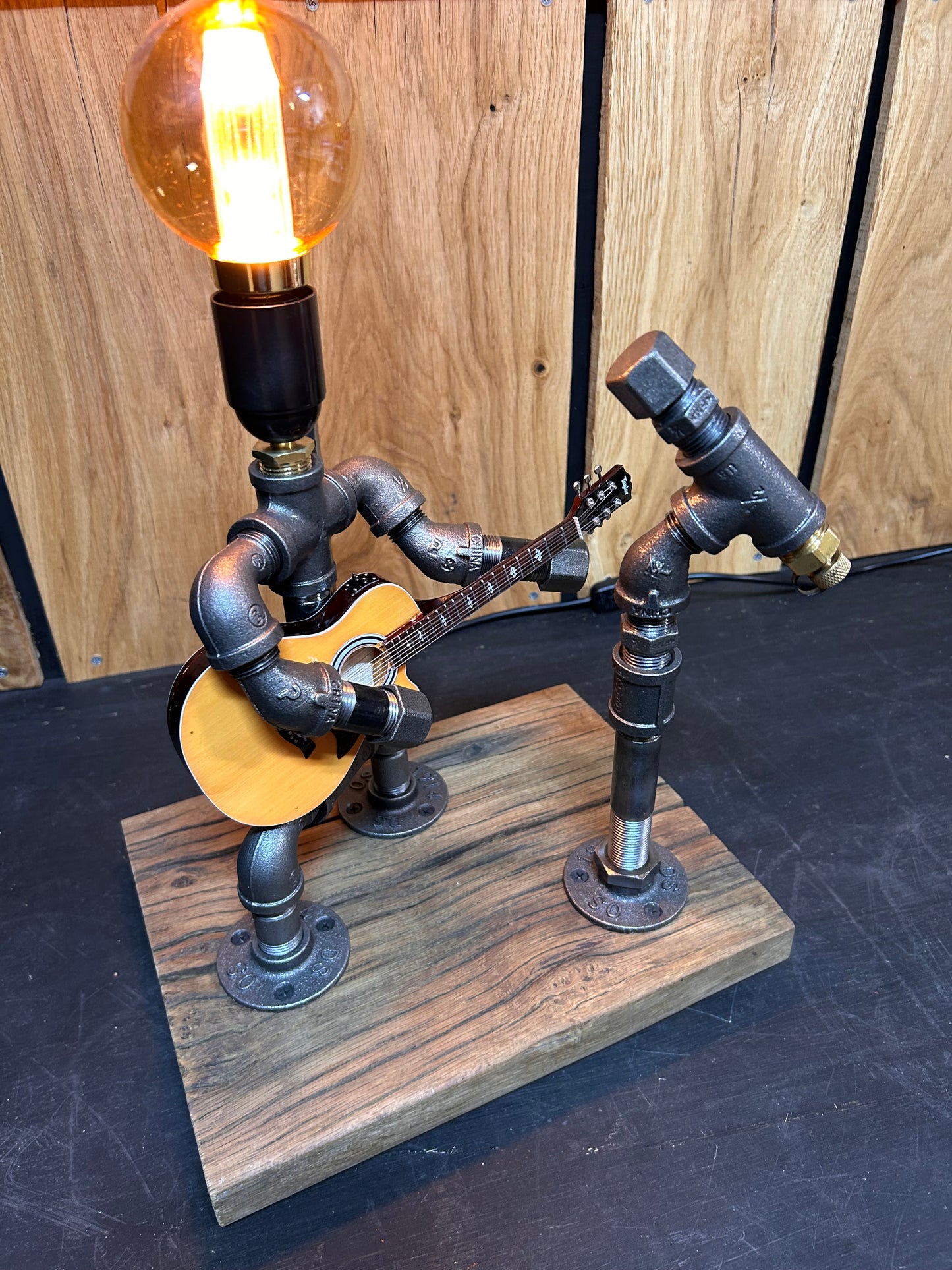 "Unplugged" - Industrial Pipe Man Guitar Lamp