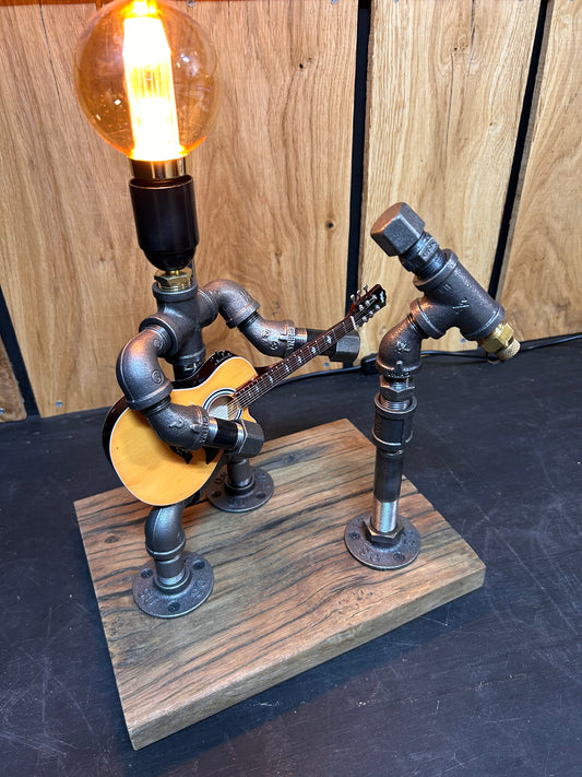 "Unplugged" - Industrial Pipe Man Guitar Lamp